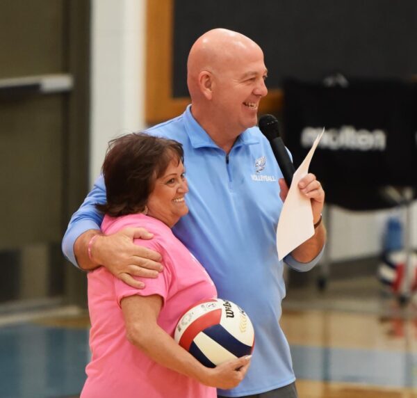 Deanna Higgins and Coach Jessen prepare for the Pink Game