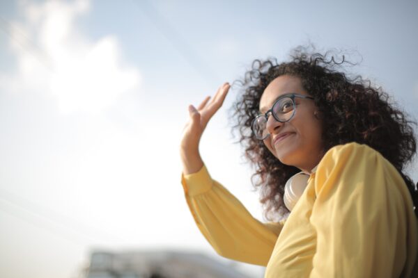 girl waving