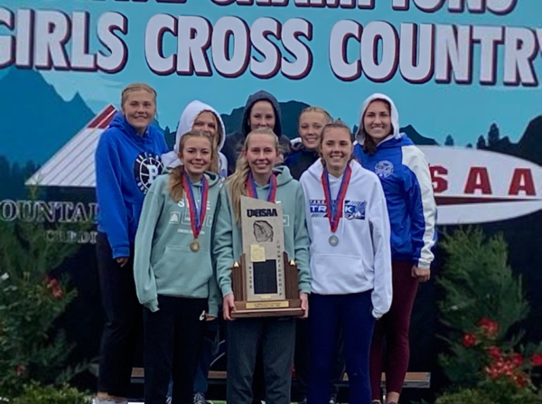 Panguitch girls cross country team poses with their trophy