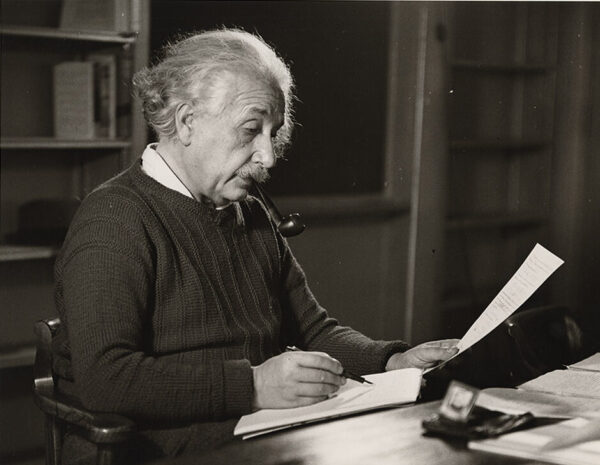 Albert Einstein reading notes in his office