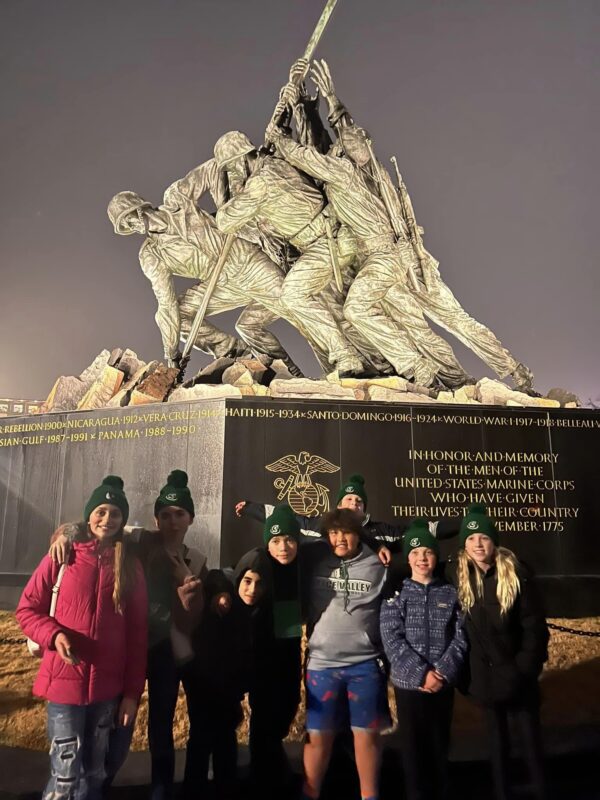 A smaller group of 6th Graders at the Iwo Jima Monument.