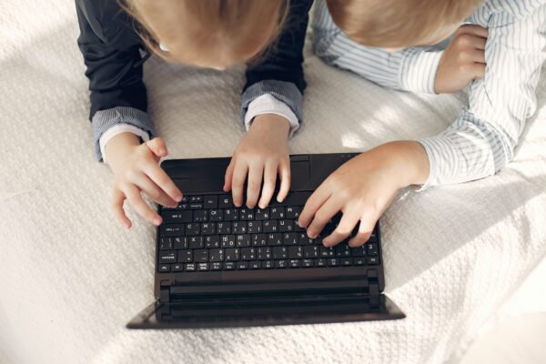 Kids on a computer.