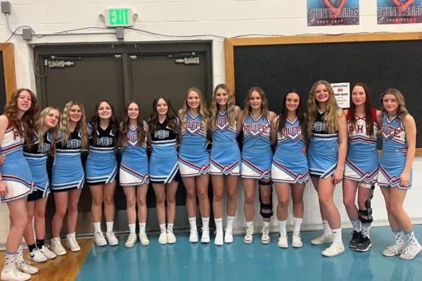 Piute’s girls basketball team dressed in cheer uniforms.