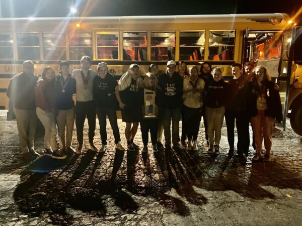 The Bryce Valley debate team in front of the bus after the 1 a.m. homecoming parade.