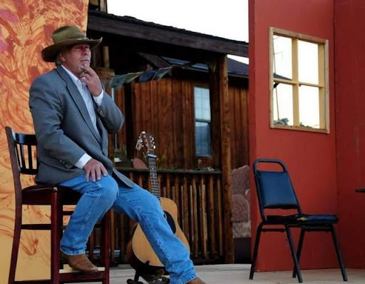 Cowboy on a porch