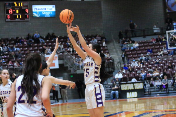 Number 15 shoots the ball.