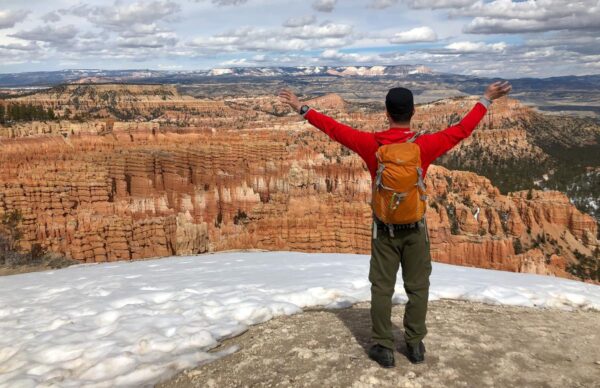 A tourist at a lookout in Bryce.