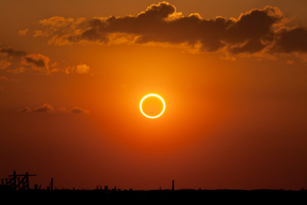 Annular solar eclipse shows a perfect ring of fire around the moon as it crosses between the sun and the earth.
