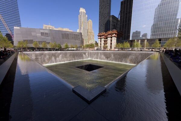 View across the south pool of the National September 11 Memorial in New York City (USA) towards the adjacent National September 11 Memorial Museum.
