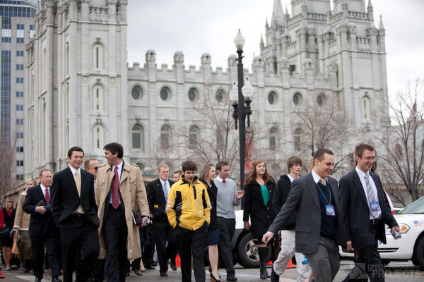General Conference attendees leave the conference center, walking past the Salt Lake Temple in 2009 before it went into renovations.