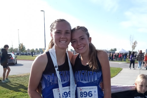 Tabi Henrie and Brooke Albrecht after the state cross country meet.