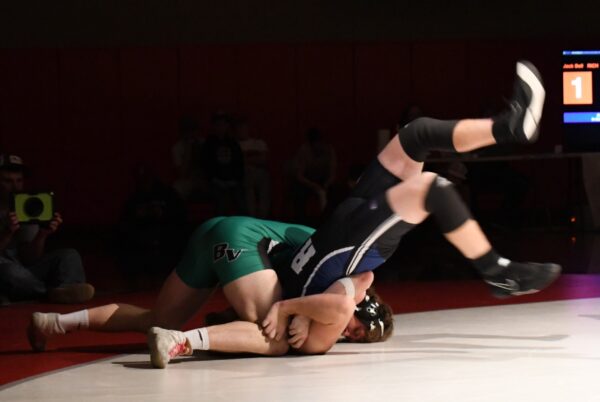 A Bryce Valley wrestler flips a Rich wrestler to get his back to the mat.