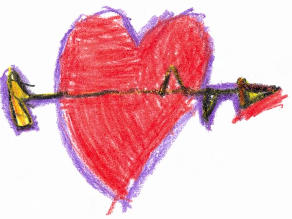 Kid's crayon drawing of a heart with a spiky arrow through it.