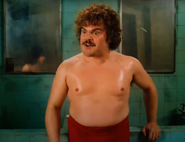Nacho Libre (fictional character played by Jack Black) talking to Steven Esqueleto after a wrestling match.