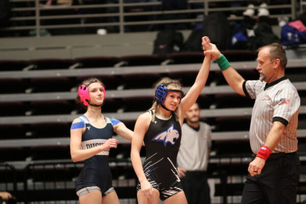Alexa Marshall wins first place at state against a wrestler from Duchesne.