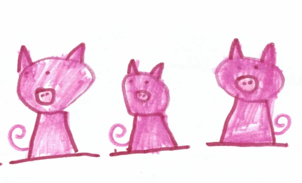 Pink pigs drawn with marker. Kid's drawing.