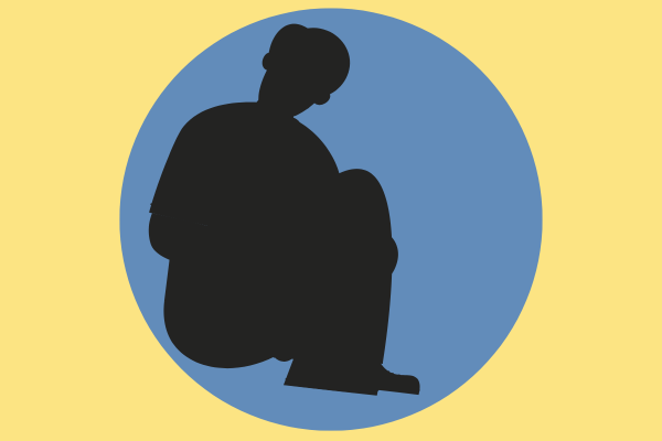 Graphic: A silhouette of a man curled up in the fetal position inside a blue circle.