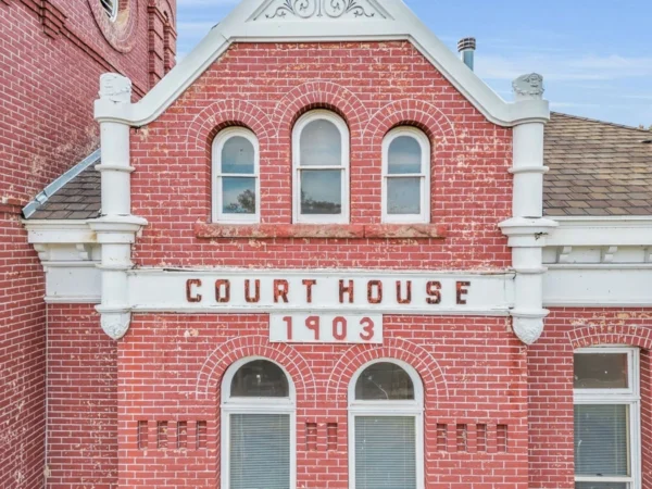 Lettering on the courthouse reads "courthouse, 1903."