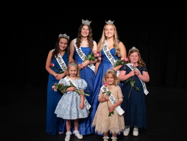 The Miss Piute royalty with their flowers, crowns and sashes.