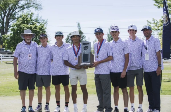 Wayne's golf team holding their trophy at state.