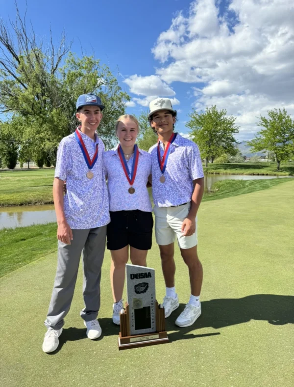 Wayne's two boys golf medalists and one girls golf medalist with their medals and 2nd place boys trophy.