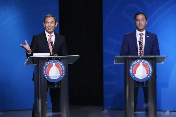 John Curtis and Trent Staggs at a debate.