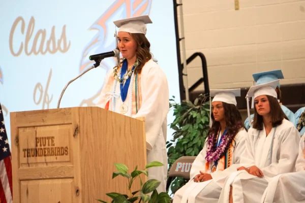 Emma Wilde speaking at Piute High School graduation.