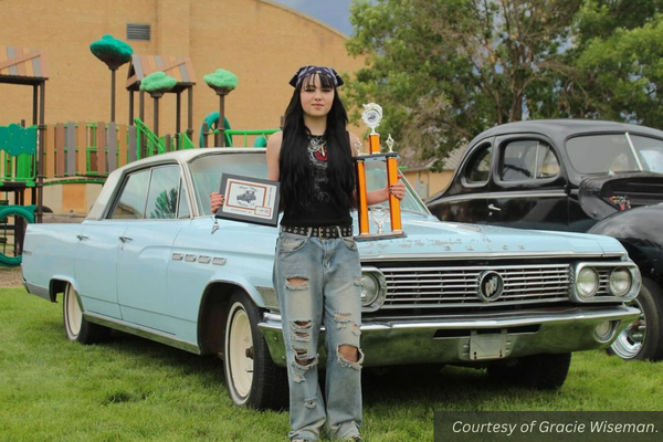 Ian Nelson with her People's Choice trophy and 1963 Buick Electra. Courtesy of Gracie Wiseman.