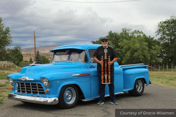 Gene Burson with his Best in Show trophy and 1956 custom-modified Chevy truck.