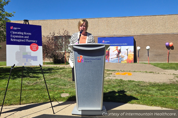 DeAnn Brown speaking at a podium outside Garfield Memorial Hospital. Courtesy of Intermountain Healthcare.