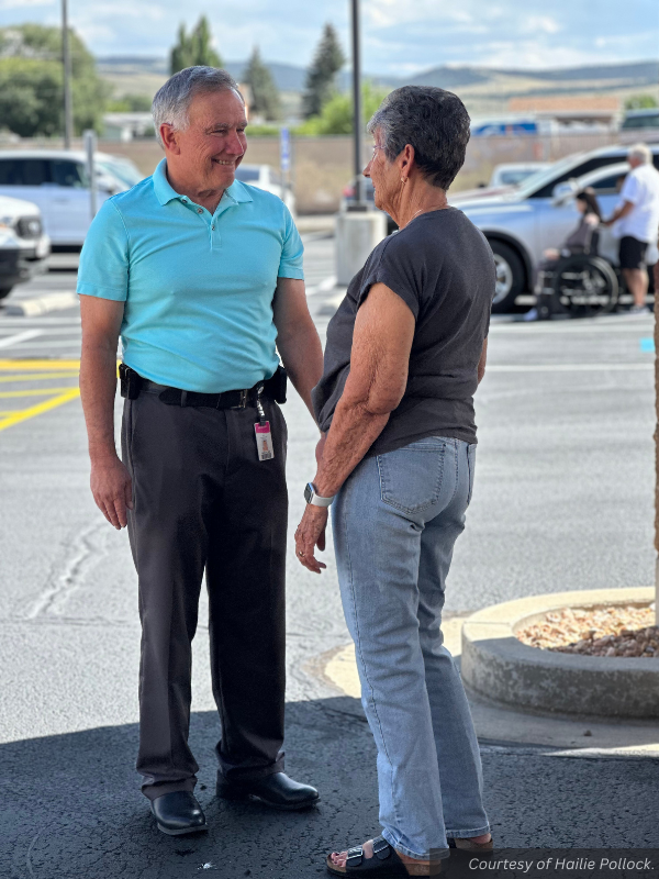 Dr. Birch greets a Rolane Davis. Courtesy of Hailie Pollock.