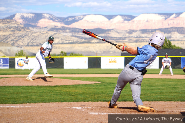 Piute number 14 hits a pitch from Bryce Valley number 34. Courtesy of AJ Martel.