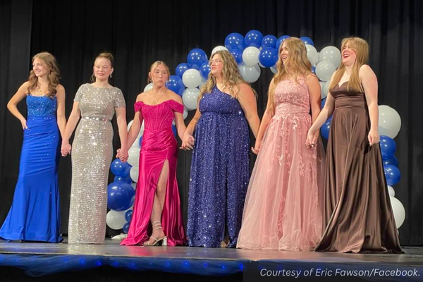 Panguitch's homecoming royalty Josslyn Griffin, Sophie Fawson, Hailey Yardley, Berkli Black, and two others stand on stage during the pageant. Courtesy of Eric Fawson.