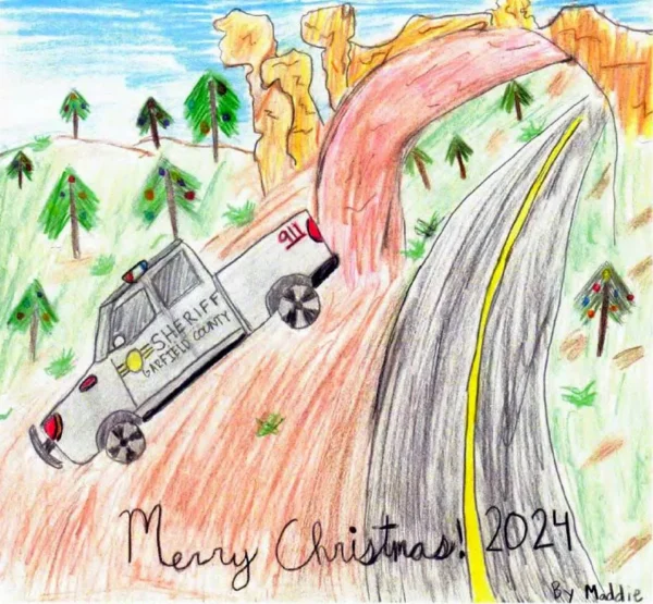 A kid's colored pencil drawing of the famous Highway 12 arch that the road goes through in Red Canyon. Hoodoos are seen behind it in orange. Just in front of the arch, a Garfield County Sheriff truck veers off the road presumably on a rescue. At the bottom, in cursive, is written, "Merry Christmas 2024."