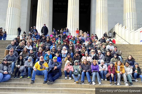 A group of 142 students, teachers and parents in front of the Lincoln Memorial. Courtesy of Donali Spevak.