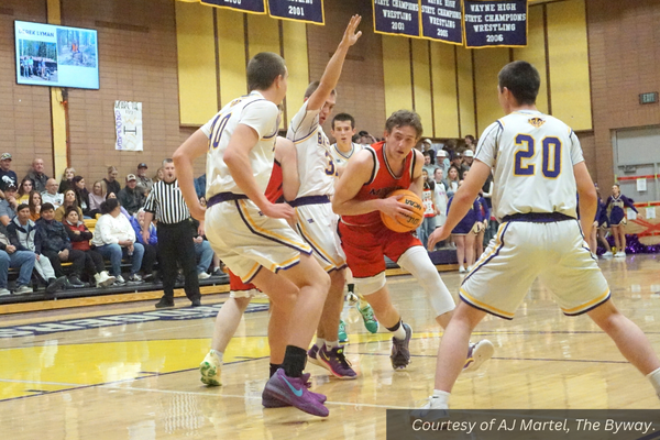 A boys basketball game at Wayne High School against Escalante. Courtesy of AJ Martel, The Byway.