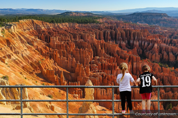 Two kids looking at the Bryce Canyon hoodoos. Courtesy of unknown.