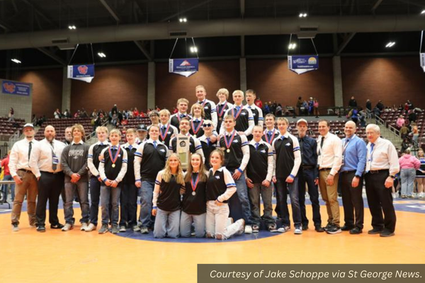 The Panguitch wrestling team with their state championship trophy. Courtesy of Jake Schoppe via St George News.