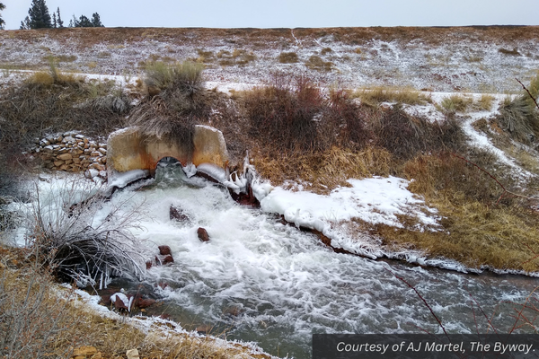 The Tropic Reservoir dam and outlet gate at the time of the release. Courtesy of AJ Martel.