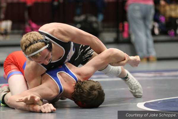 Panguitch wrestler Braxton Atkin working to turn a Water Canyon wrestler on the mat at state. Courtesy of Jake Schoppe.