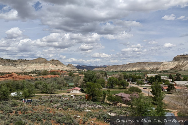 An aerial view of Cannonville, a small town surrounded by red rocks and white mountains. Courtesy of Abbie Call, The Byway.