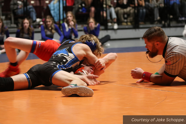 James Houston pins a Water Canyon wrestler at state. Courtesy of Jake Schoppe.