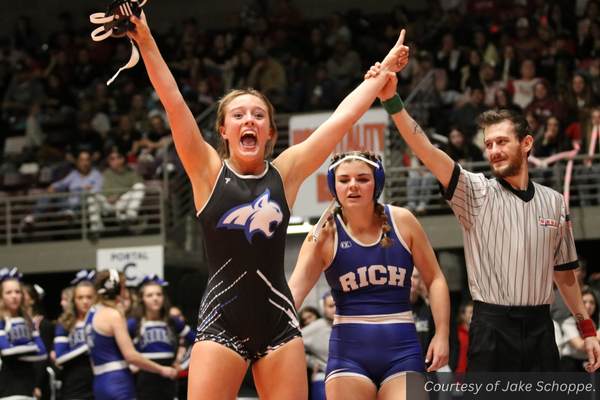 Kieran Mooney wins first place in her weight category at state wrestling 2024. Courtesy of Jake Schoppe.